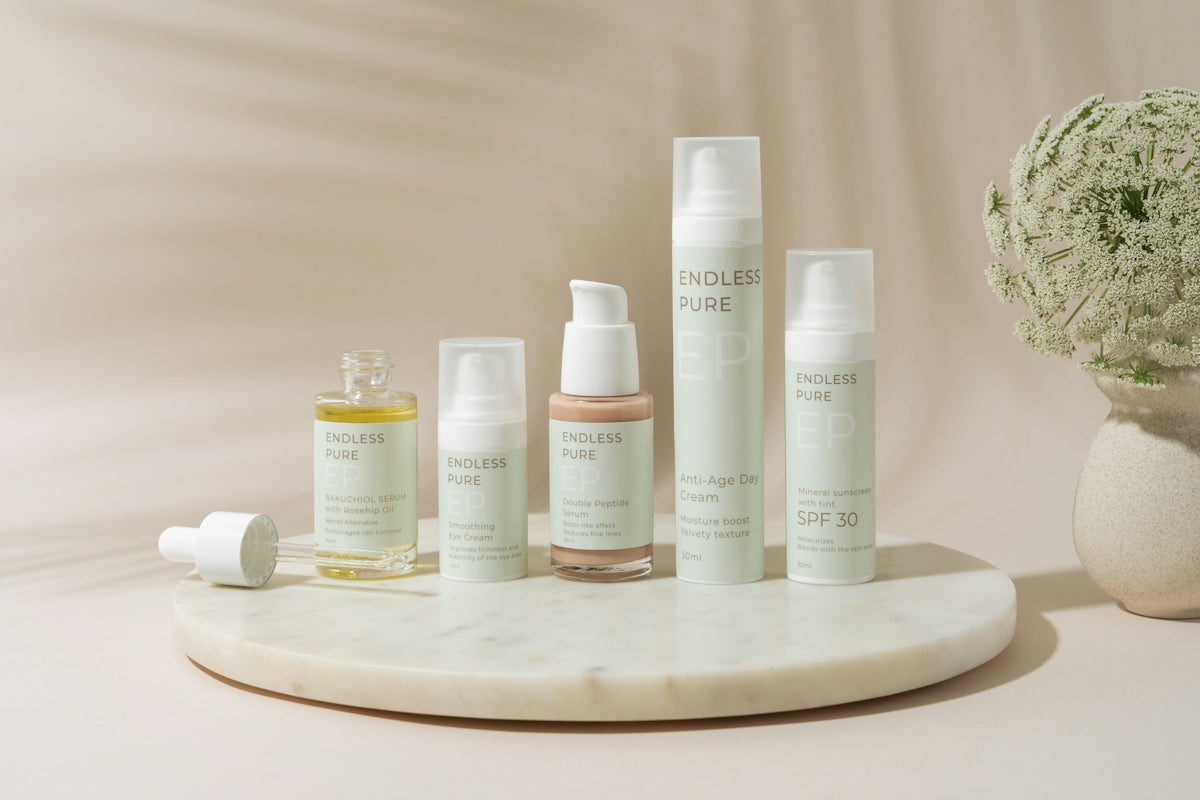 A white vase filled with lots of different types of skin care products