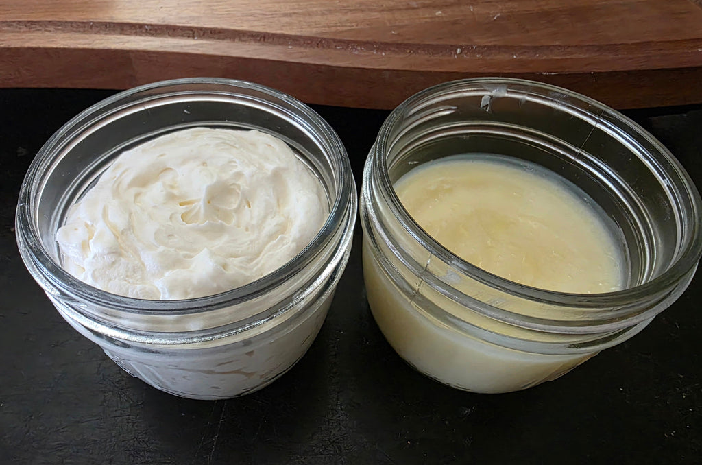 Orange and chamomile infused grass-fed tallow whipped cream and balm in glass mason jars