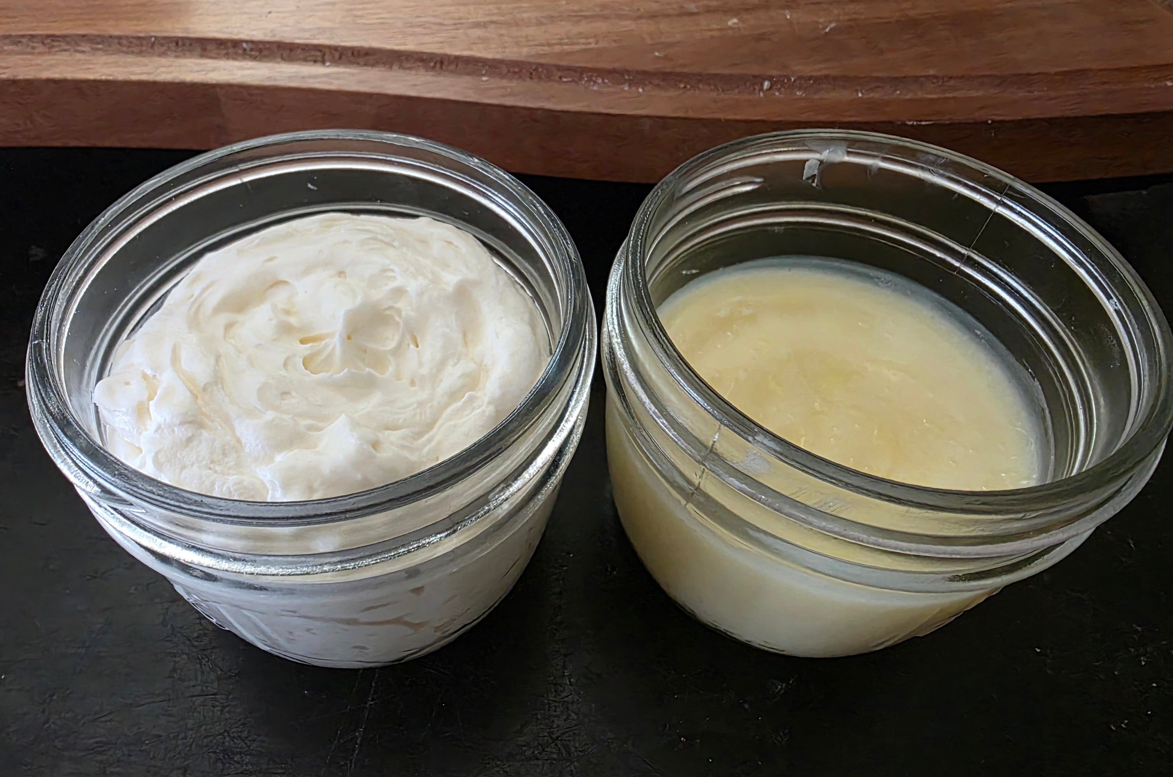 Orange and chamomile infused grass-fed tallow whipped cream and balm in glass mason jars